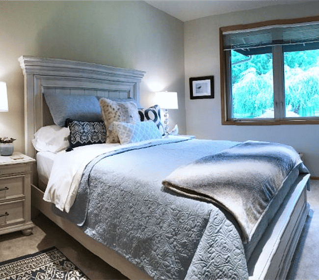 Bedroom 2 offers a queen bed, pillow-top mattress, luxurious hotel quality sheets, a down comforter and 4 down pillows. The window has a gorgeous view of the front gardens and blinds for privacy and room darkening. This bedroom is in soothing colors of blues, cream & white so can rest and relax in this cozy room!