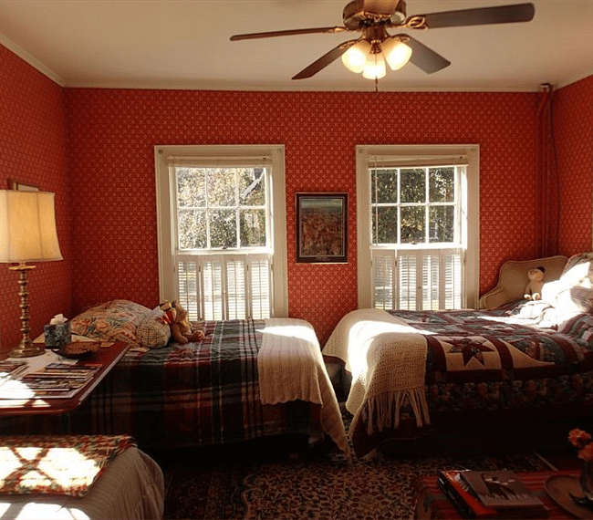 1st Floor Apt - Queen plus Full Bedroom, has Couch, Ceiling Fan, and 3 large Windows, West Facing