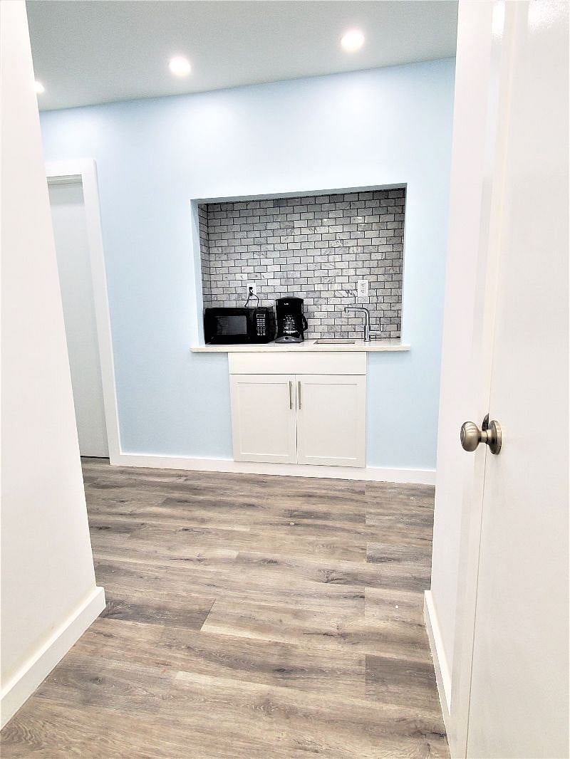 There is a Wet Bar outside the bedroom. Come get a quick cup of purified water, make some coffee or use the microwave.