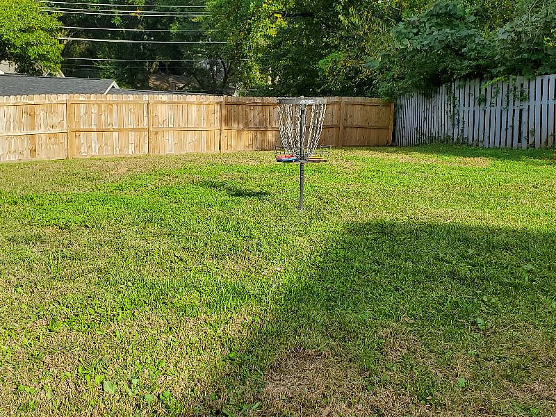 Play a couple rounds of Frisbee Golf in a huge backyard