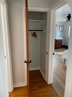 An additional coat closet is located outside the bedroom.