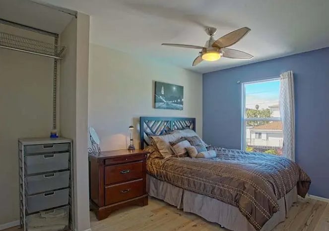 Primary-esq room, in that there is a door that leads directly into the shared bathroom.