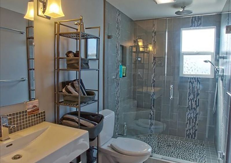 Custom tile in this luxurious bathroom with a palatial shower.