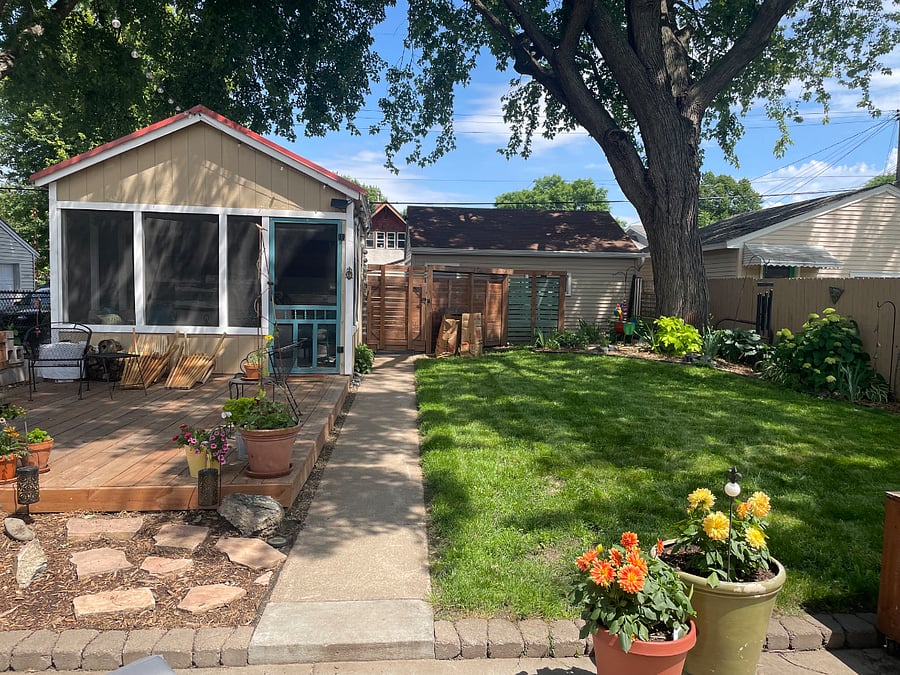 Backyard with screened in porch/sitting area