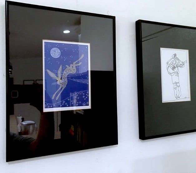 Original prints by Sarah Earle and Missy Maloney.