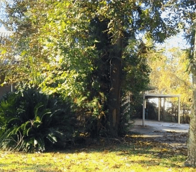 Covered carport for apartment.