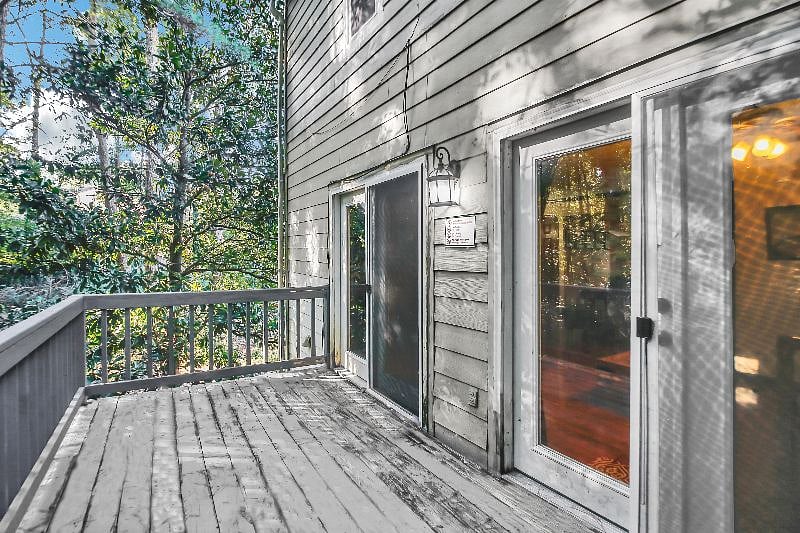 Big ole deck for you to relax or enjoy the woods and creek behind the house
