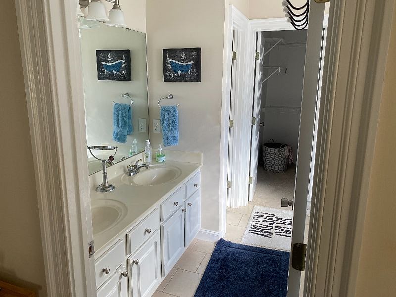 Master bathroom, shower, jacuzzi tub, and master closet.