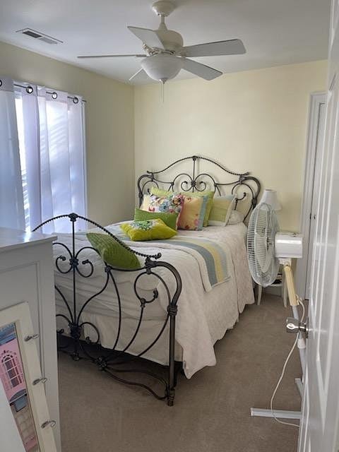 Smaller bedroom which rents for $850 per month includes access to the entire home as well as the amenities
