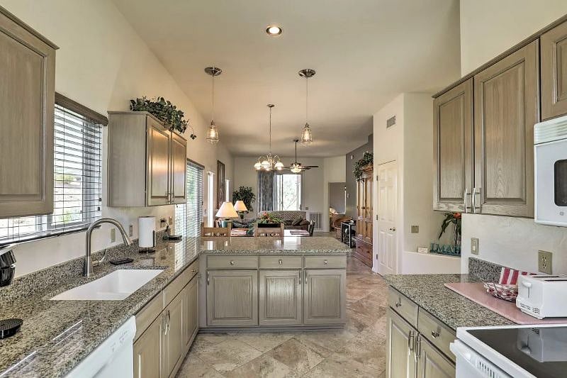 Unit A, Kitchen, granite composite deep double sinks, pull-down/spray faucet, ceramic glass top Range-Oven