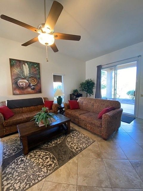 Unit A Living Room, Rear patio doors, overhead ceiling fan & lighting