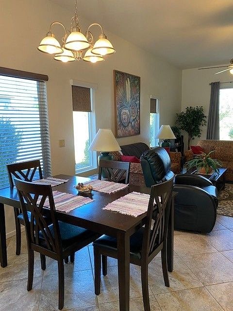 A-Dining & Living Rm Areas, remote-control comfort recliner, sliding doors to rear patio