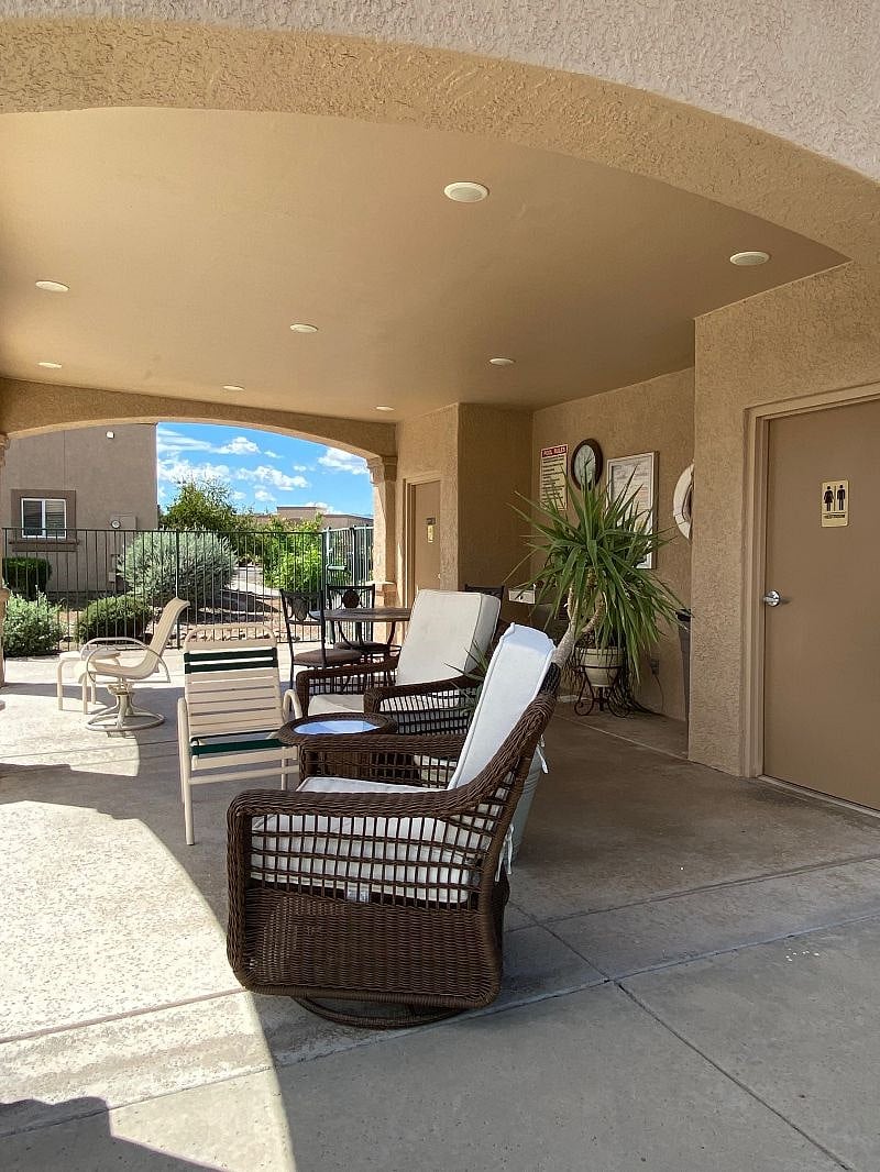 Pool Ramada-covered area with outdoor furniture