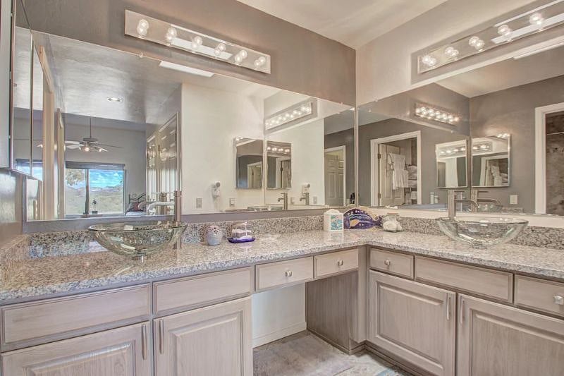 Unit A Master Double sinks, vanity, granite C-Tops.