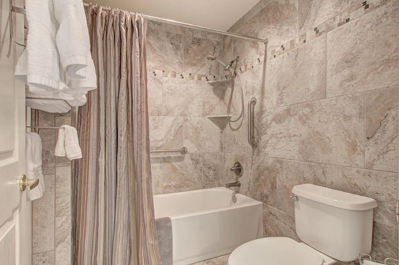 Unit A all ceramic tile, Shower/Tub/Toilet