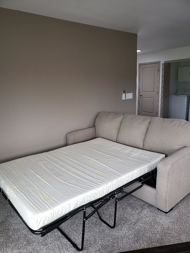 GUESTS...For your house guests, this couch is a "full size" Hide-a-bed.