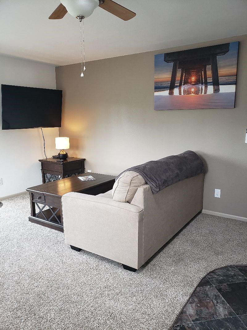 Your comfy couch, (also a hide a bed "full size" for guests) coffee table that lifts up to you so you can eat, drink or just have your laptop closer to you. a beautiful 55" TV with full cable channels and internet throughout.