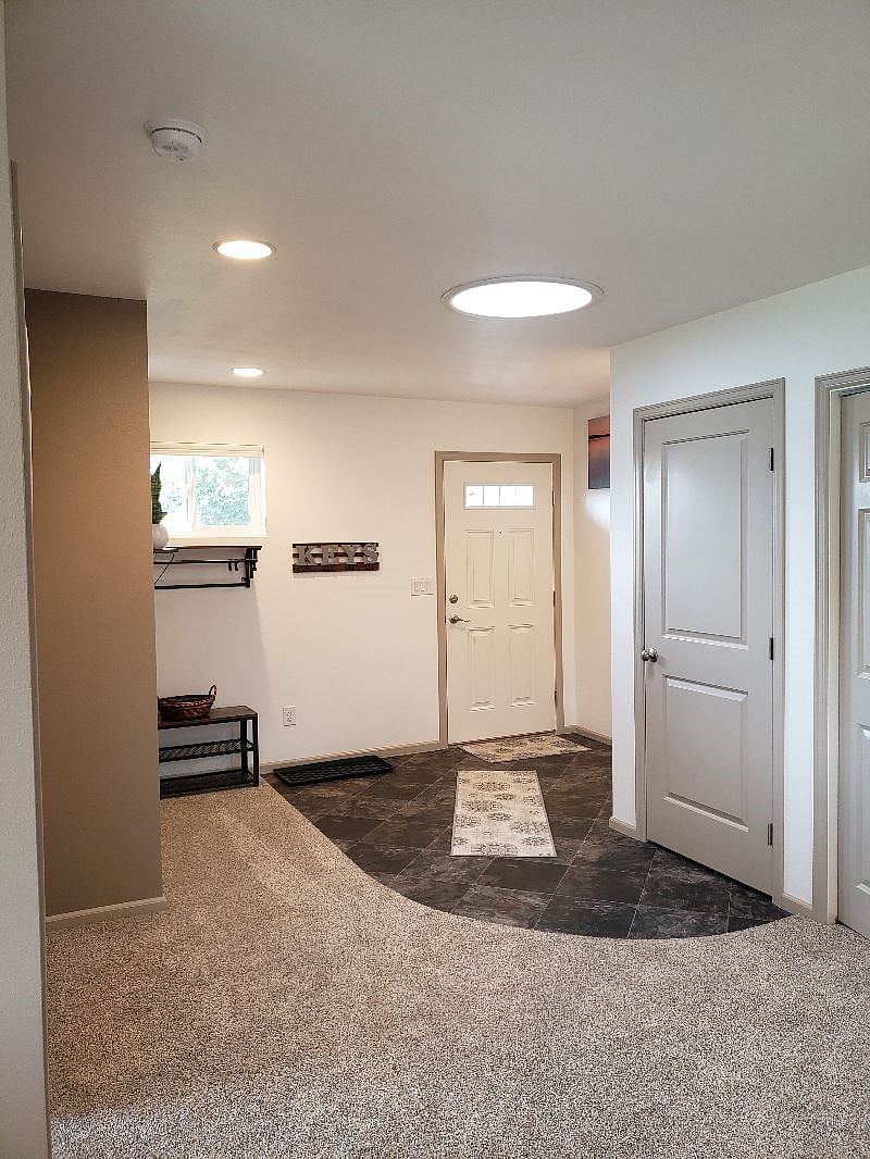 Another view of the front entrance. Really cool carpet and radiused designs make for a calmer attitude too.