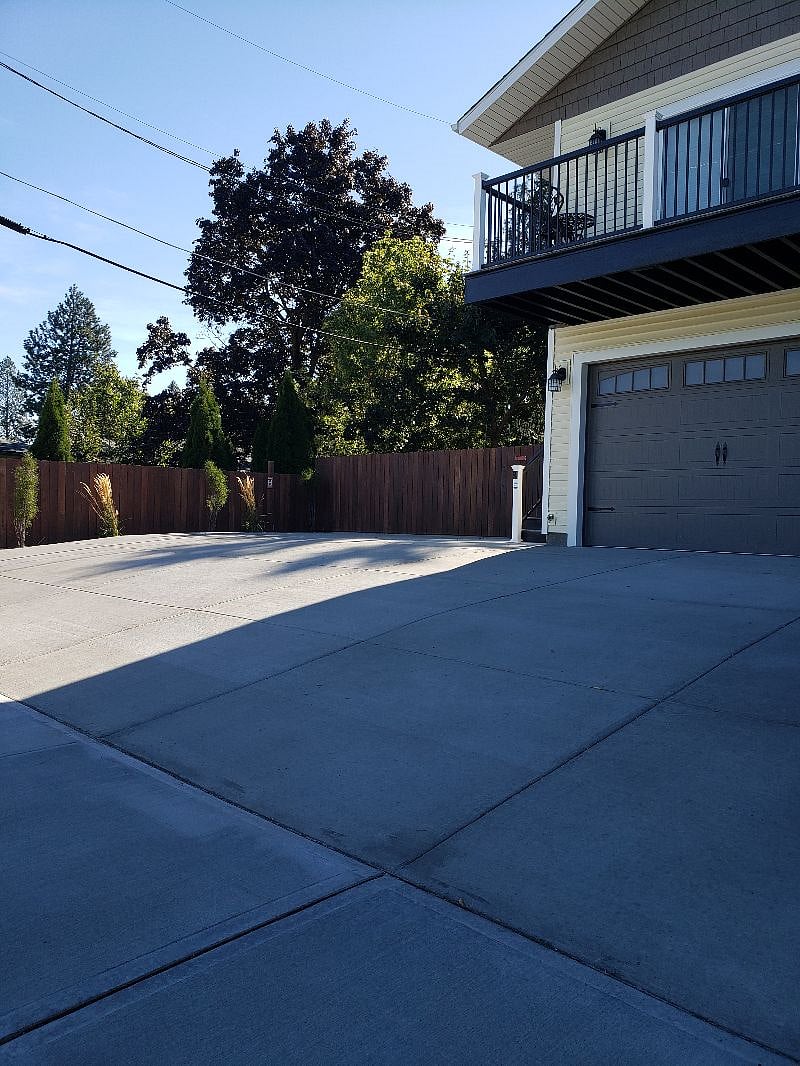 There's a partial picture of your garage door. Yep, you get massive outside SAFE parking Plus a HUGE garage you can get lost in! Yep, you deserve this!