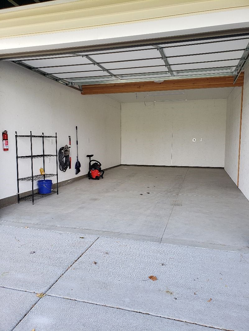 HUGE garage...Amazing for storage and OF COURSE to park your car in. Has everything you need to keep your car washed and vacuumed...