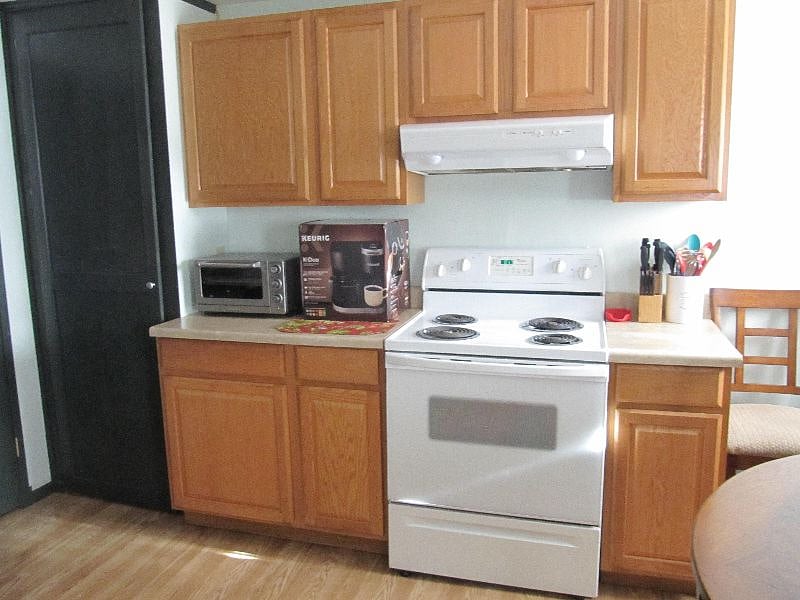 Full size stove, Kurig & toaster Oven