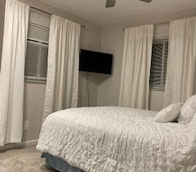 Queen size adjustable bed with Roku TV two lake view windows