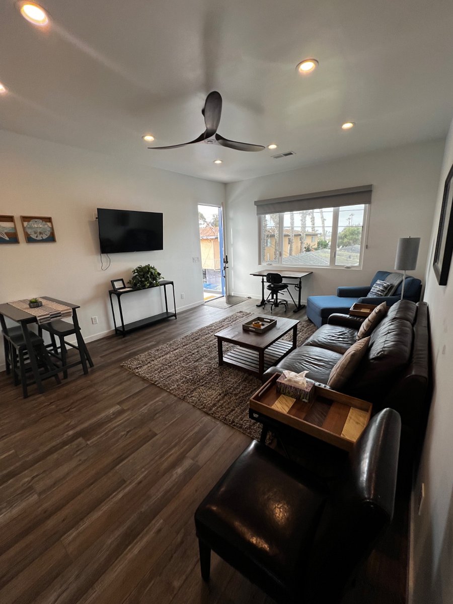 living area with dining area, smart tv, work desk