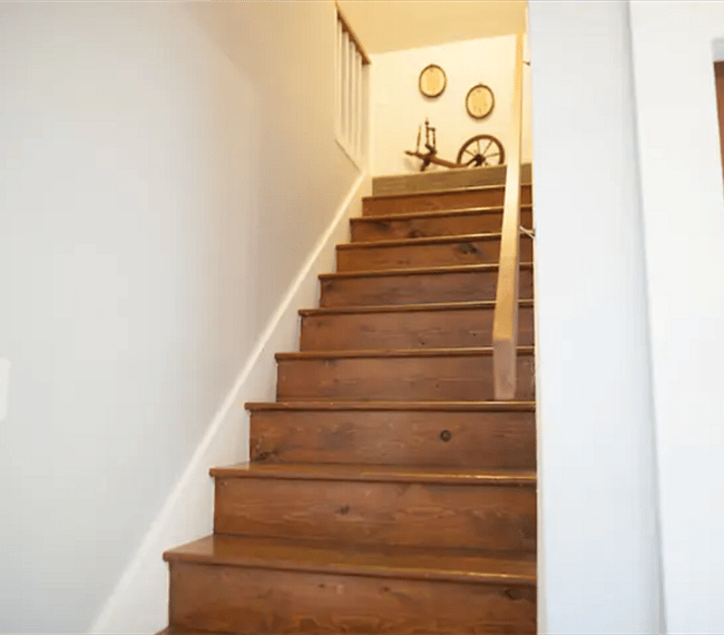 Up the stairs. We bought the quietest garage door opener available.