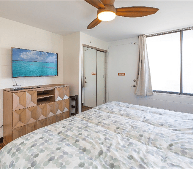 Settle in and watch a movie on the flat screen TV