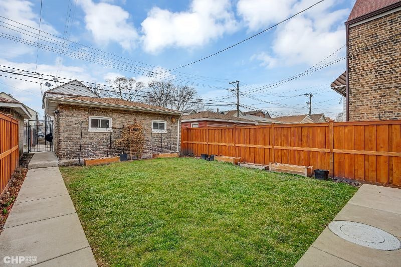 Backyard shared space. Fully fenced in back yard.