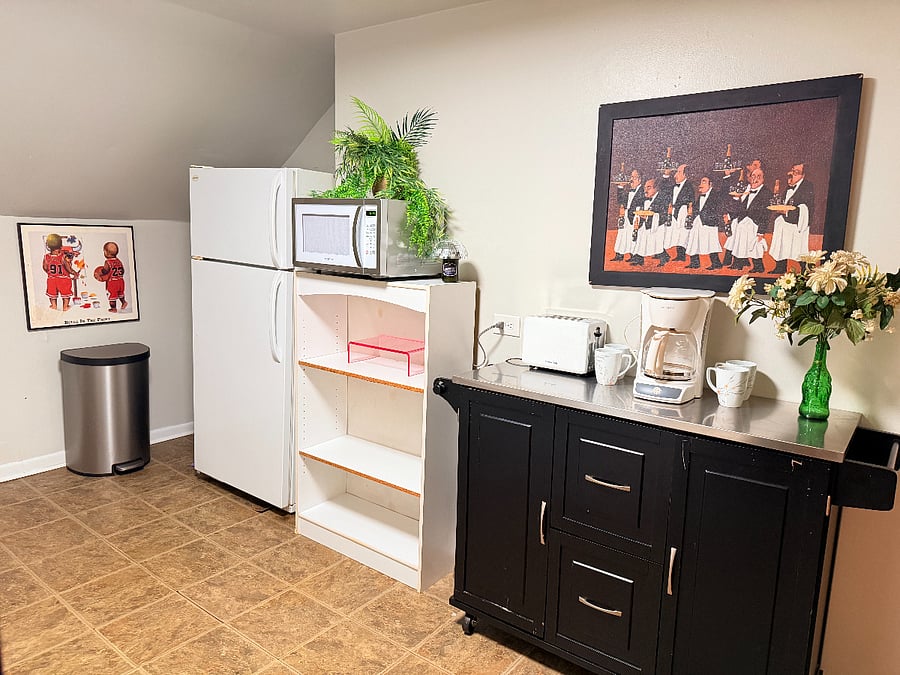 A fully equipped kitchen featuring a microwave, coffee maker, and everything you need to prepare meals with ease.