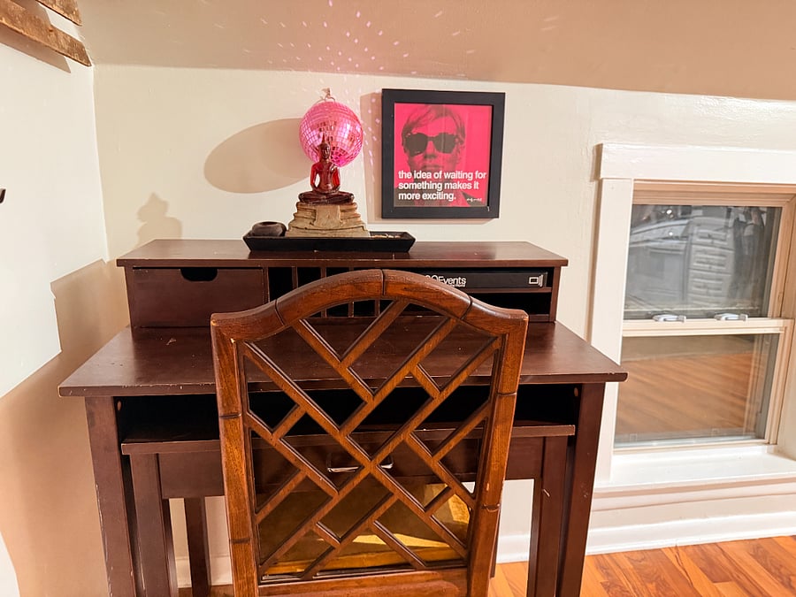 A dedicated workspace with a functional desk and comfortable seating, providing the perfect place to focus, work remotely, or stay organized throughout your stay.