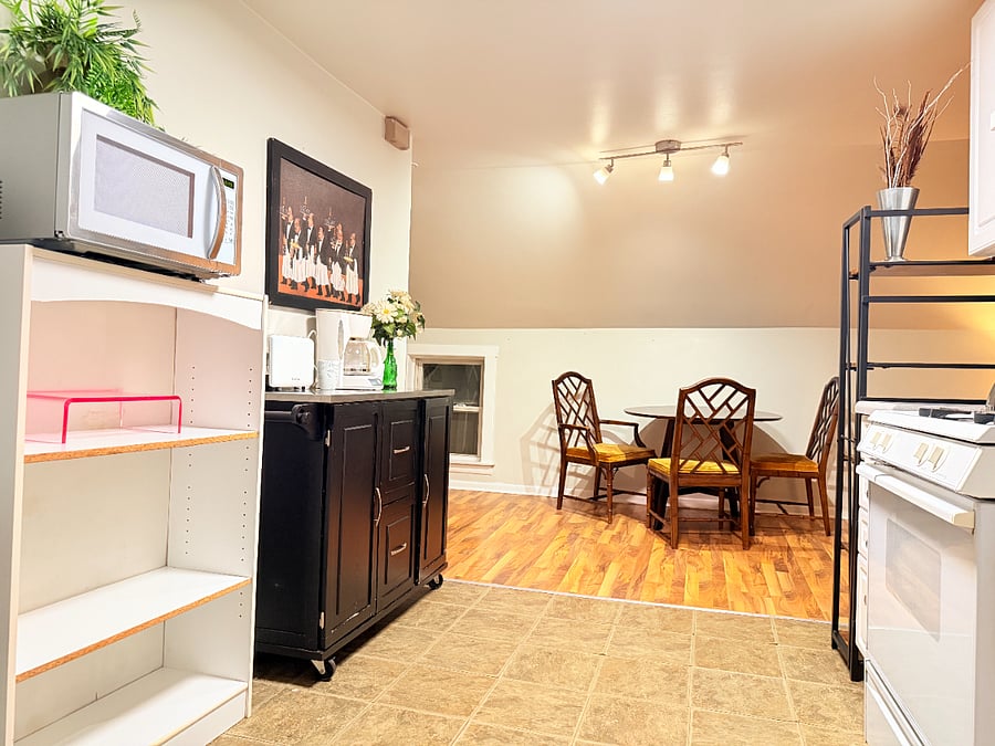 Fully equipped kitchen with direct access to the dining area, perfect for easy meal prep and serving.