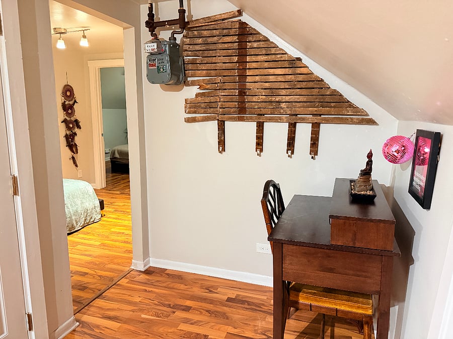 A dedicated workspace with a functional desk and comfortable seating, providing the perfect place to focus, work remotely, or stay organized throughout your stay.