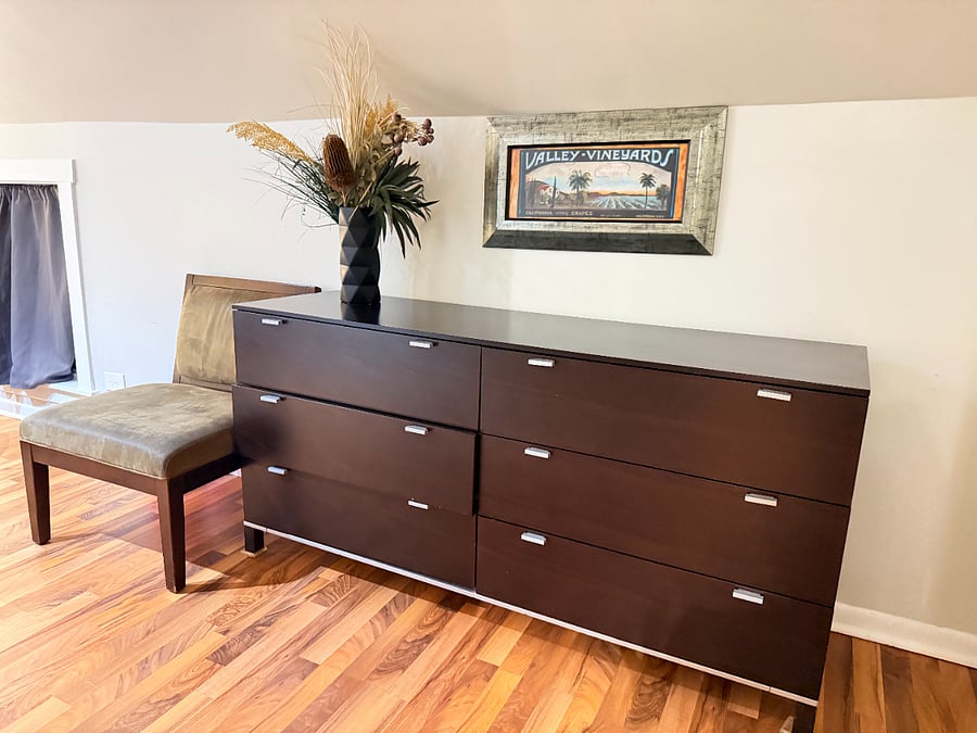 Large dresser with ample drawer space to keep your belongings organized.