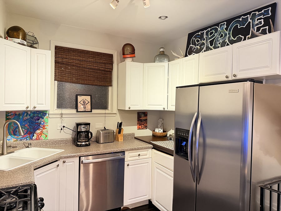 Start your day right in a fully equipped kitchen featuring a coffee maker, toaster, refrigerator, and everything you need for easy meals. Clean, modern, and designed for convenience, it's perfect for preparing delicious home-cooked meals.