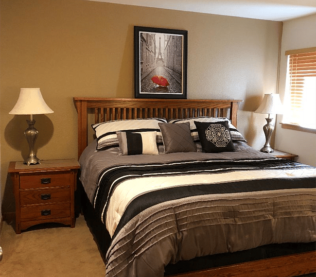 Full Cal. King Bed, full matching set with real wood night stands, dresser, frames, etc... Also large, Hotel style lamps on nightstand.