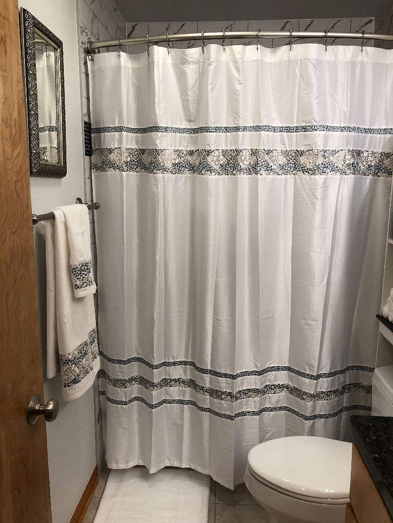Comfortable deep tub in newly remodeled bathroom.