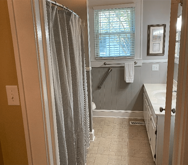 Back Bathroom w Tub. Tankless Hot Water Heater (Endless Hot Water)