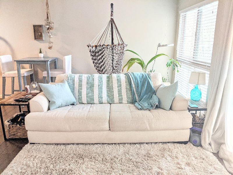 Melt into this comfortable couch or read a book in the relaxing hammock chair.