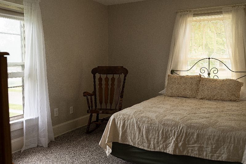 The Edna One Room, is a beautiful, quiet room that includes a closet, a chest of drawers, a full length mirror, and touch pad lock on the door for your security.