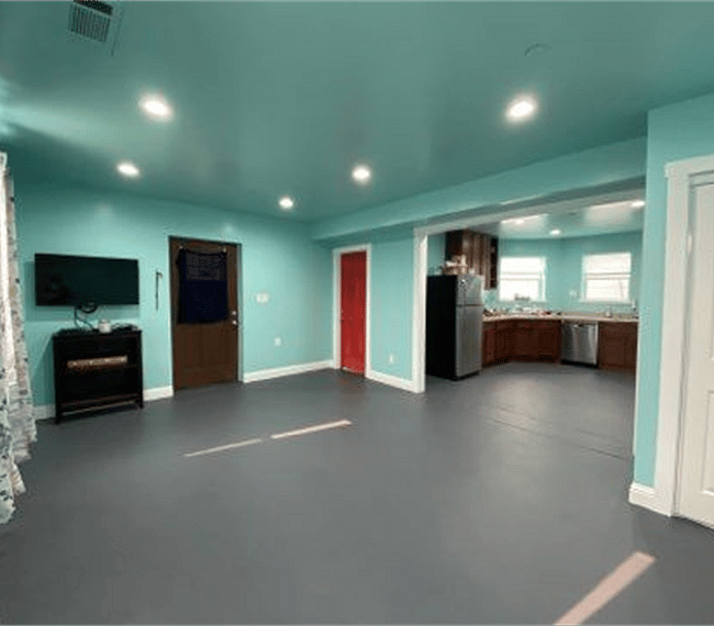Spacious open living with TV 