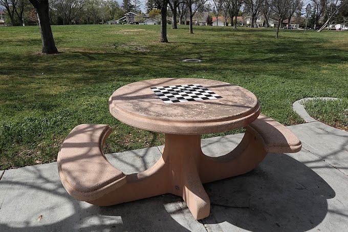 Park 2 blacks away with chess board