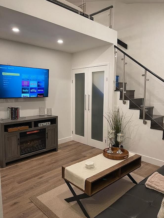 LIVING ROOM INCLUDE:
- large LED T.V
- electric fireplace