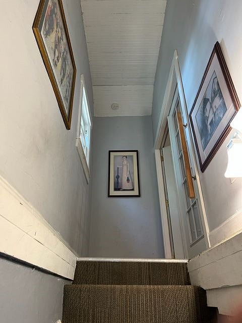 Hallway at top of stairs. This unit has its own outside door.