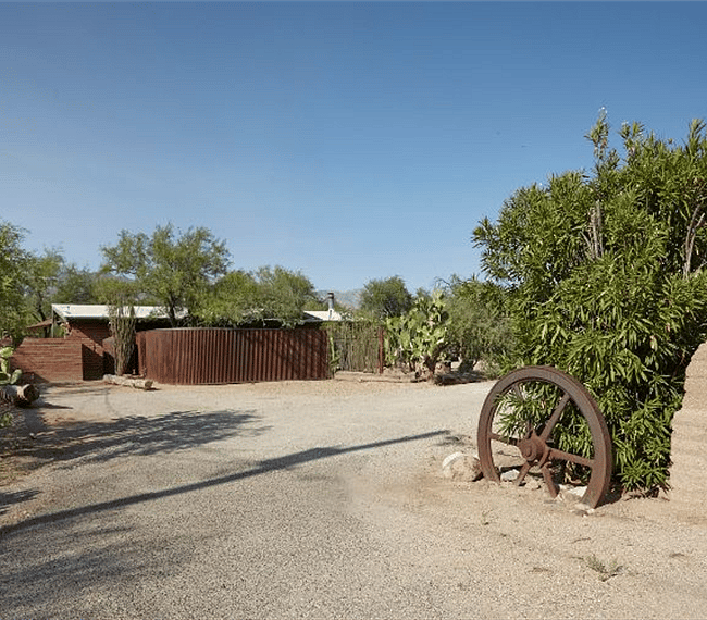 Entrance to Property: Parking Space is on left by fence