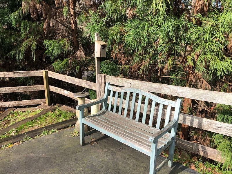 Bench in front of apartment