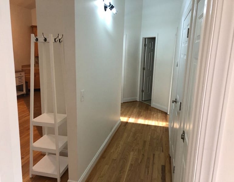 Hall to back bedroom and half bath.