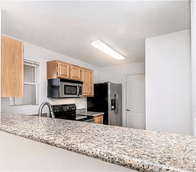 view of kitchen with stainless appliances
