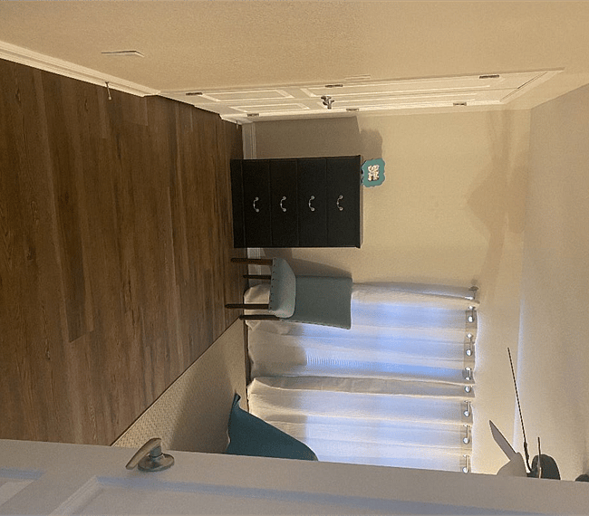 dresser and 2 closets in primary bedroom. one of the closets is a huge walk in closet